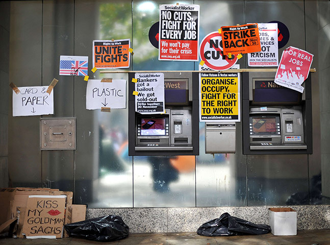 Occupy London Protests: Placards cover ATM machines