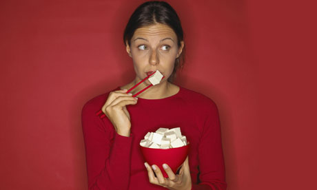 Woman eating tofu