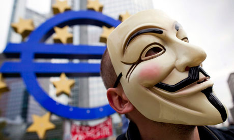 Guy Fawkes masks have become the global face of the Occupy protests. Photograph: Frank Rumpenhorst/EPA