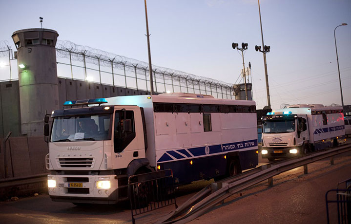 gilad shalit release: A convoy of Israeli prison service buses carrying Palestinian prisoners