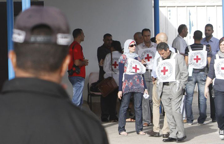 gilad shalit release: Members of the International Red Cross at the Rafah crossing with Egypt