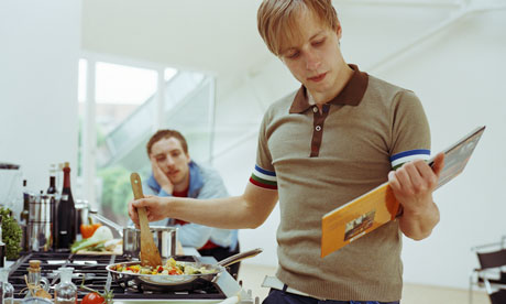 Two young men in a kitchen