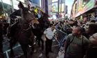 Occupy protests: Occupy Wall Street participants in Times Square in New York