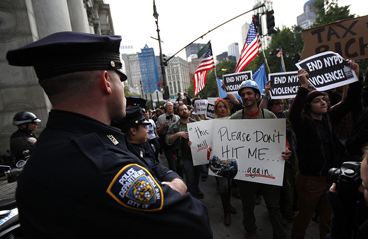 Occupy protests: Occupy Wall Street protesters march against police brutality