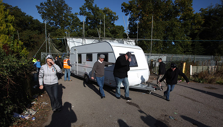 Dale Farm camp: Activists move a caravan to a safer spot during evictions from Dale Farm