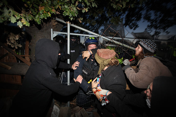 Dale Farm camp: Activists confront police as they enter the site at Dale Farm