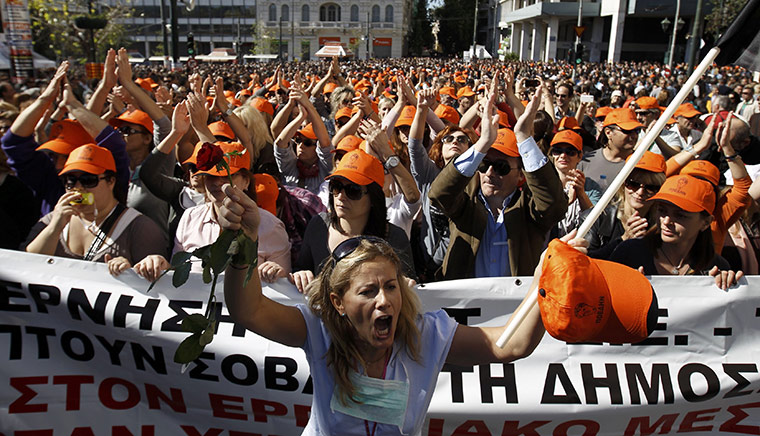 Greece strikes & protests: A woman shouts while taking part in an anti-austerity rally 