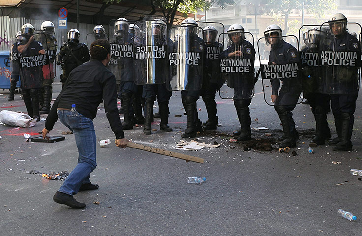 Greece strikes & protests: Strikers clash with riot police during a strike demonstration in Athens 