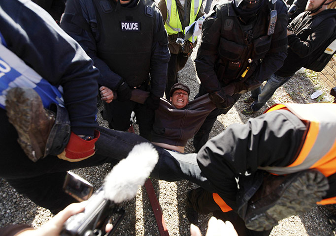 Dale Farm: An activist is removed by police and bailiffs during evictions