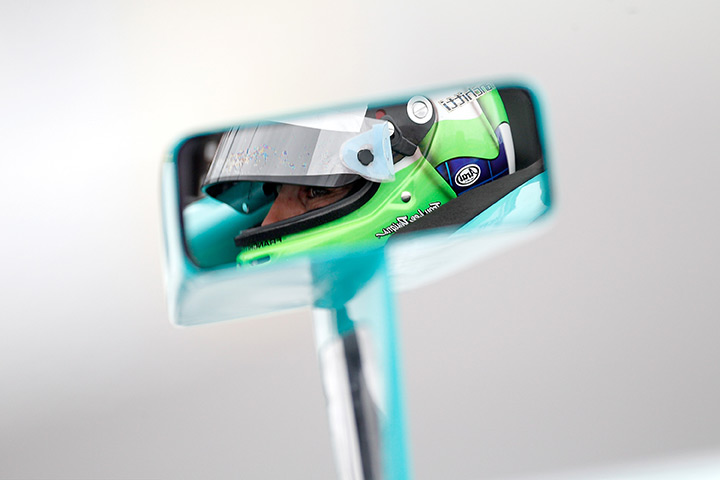 24 hours in pictures: Dario Franchitti of Scotland sits in the pits at Kentucky Speedway, Sparta