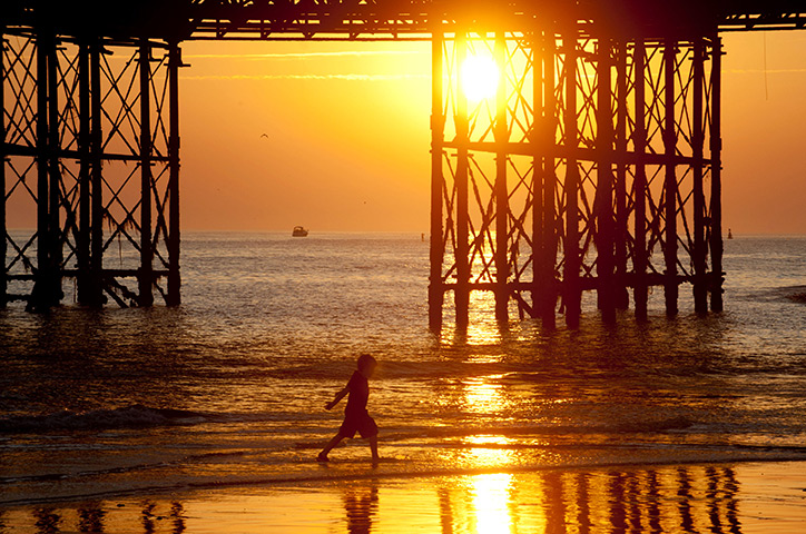 UK October heatwave: Sunset on Brighton beach