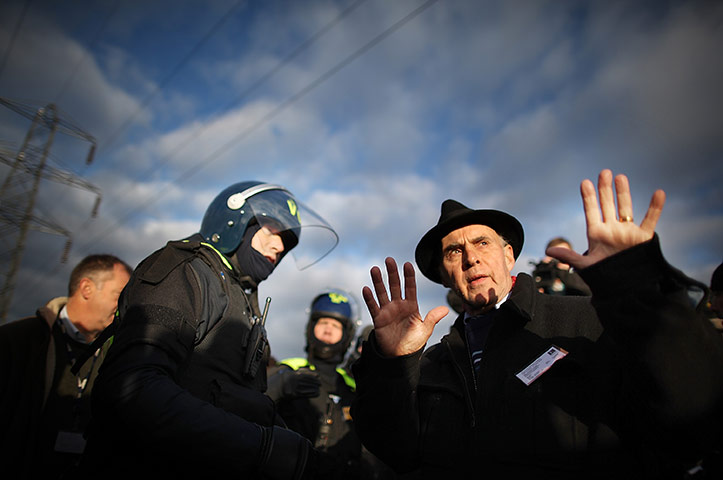 Dale Farm evictions: Grattan Puxon from The Gypsy Council negotiates with a policeman