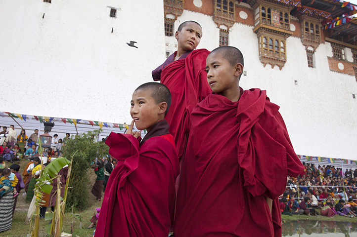 From the agencies: Monks watch the Bhutan royal wedding