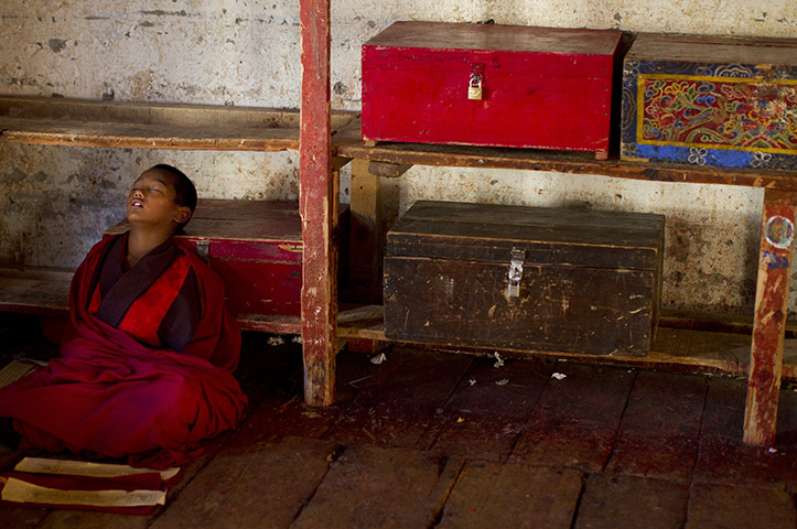 From the agencies: A novice monk sleeps In Thimphu Bhutan
