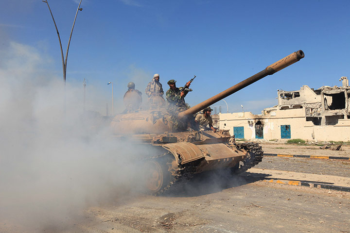 Sirte falls: Anti-Gaddafi fighters celebrate the fall of Sirte