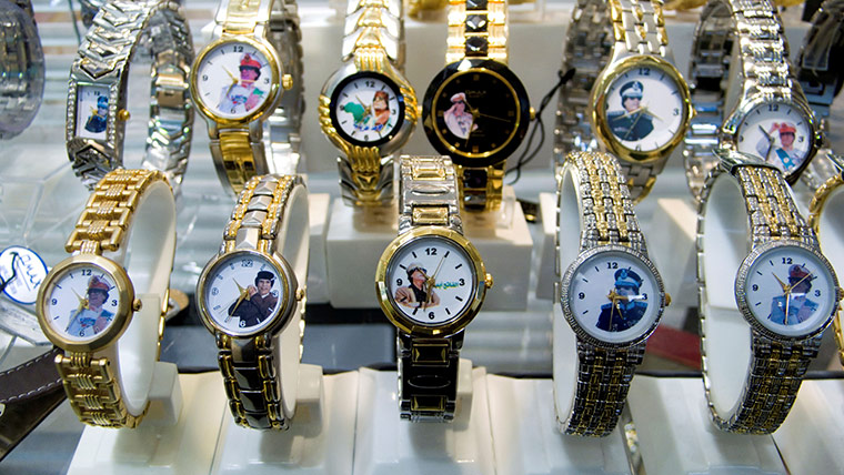 Cult of Gaddafi: Wristwatches with a picture of Colonel Gaddafi on them, Tripoli, Libya