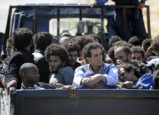 Libya celebrates: NTC vehicle transports fighters loyal to Muammar Gaddafi, Sirte 