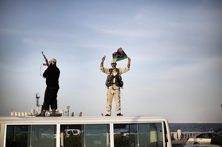 Libya celebrates: NTC fighters celebrate in the streets of Tripoli