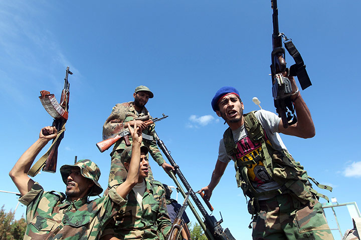 Libya celebrates: Libyan National Transitional Council (NTC) fighters celebrate in Sirte