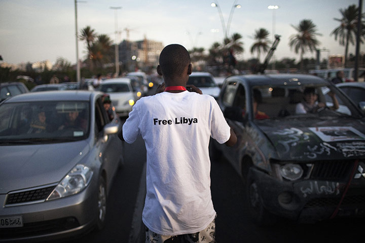 Libya celebrates: A Libyan man wearing a tshirt bearing the slogan 