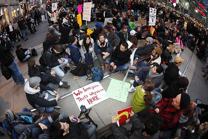 Occupy Protests: Toronto, Canada: Protesters gather at Dundas Square, Occupy Toronto