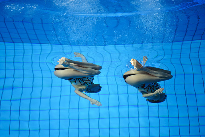 24 hours in pictures: Guadalajara, Mexico: Synchronized swimming final at the Pan American Games