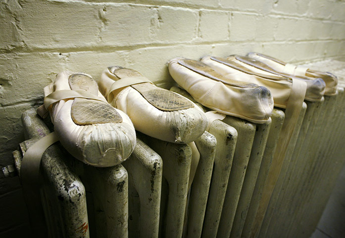 Seven days on stage: Ballet shoes drying on a radiator at the London Coliseum