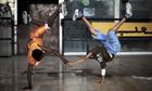 The B-Boys, a group of Libyan breakdancers, practice outside a run-down government building, Tripoli