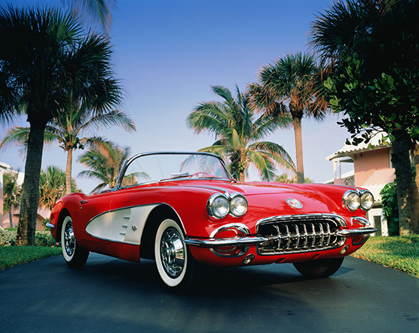 Chevrolet: A red and white Chevrolet Corvette