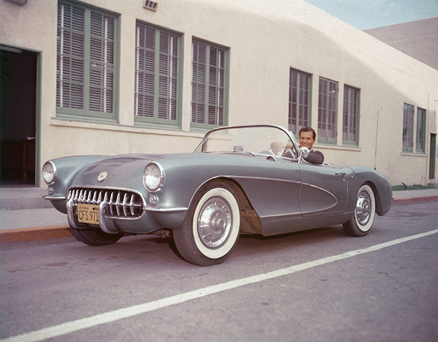 Chevrolet: Singer Pat Boone sits in his 1956 or 1957 Chevrolet Corvette sports car