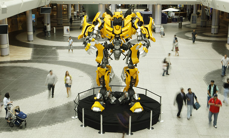 Chevrolet: Shoppers walk past Transformers star 'Bumblebee' 