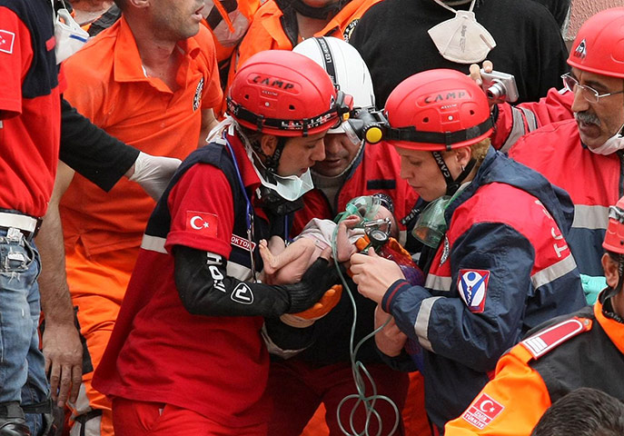 Turkey earthquake: Rescue workers carry Azra Karaduman, a two-week-old baby 