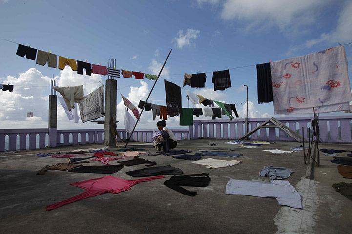 FTA: Adnan Abidi: Washing hangs out to dry on the roof of Ziona's residence in Baktawng