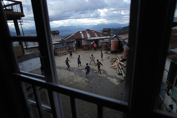 FTA: Adnan Abidi: Ziona's son and grandsons play football at their home in Baktawng village