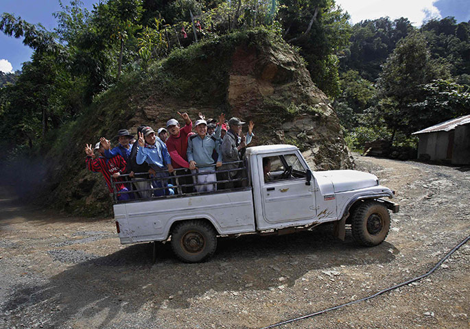 FTA: Adnan Abidi: Ziona's family wave from a vehicle on their way to a church construction