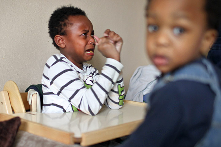 Save the Children: Mekhye, eight, and Gabriel, two, live in a two-bedroom social housing flat 
