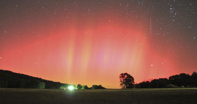 northern lights: The northern lights, or aurora borealis, in Ozark, Arkansas, US