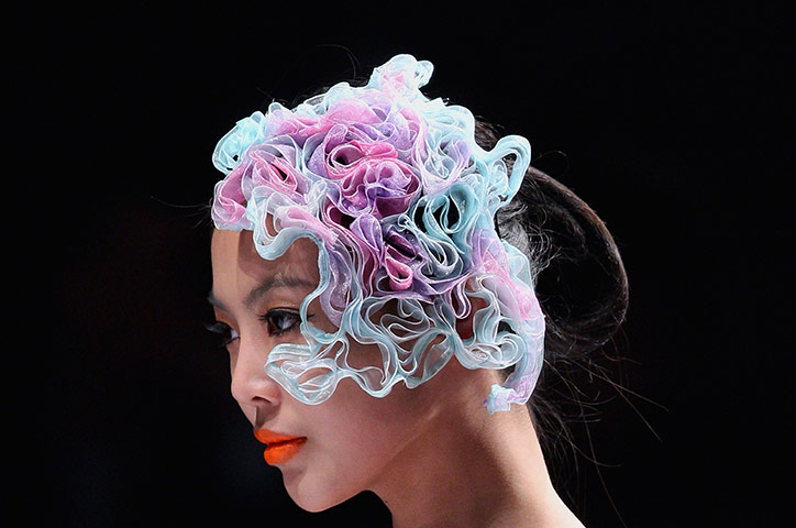 24 hours in pictures: Beijing, China: A model during China Fashion Week