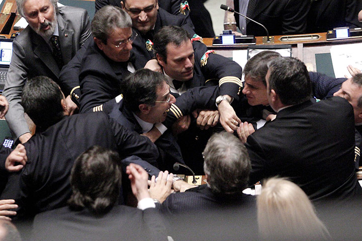 24 hours in pictures: Rome, Italy: A brawl breaks out between MPs