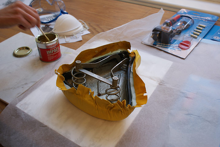 Bike blog: saddle making: 9b Cut thin triangles out of the leather where it would bunch up otherwise