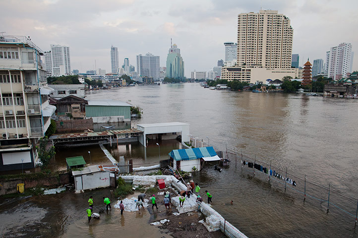 thailand flooding: flood defences on the banks of the  Chao Phraya in Bangkok