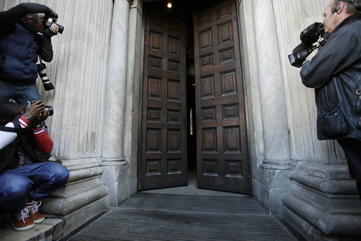 St Paul's Cathedral: Photographers and a cameraman document the entrance doors