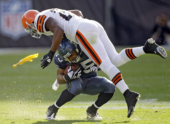 The week in sport: Seattle Seahawks' Doug Baldwin is hit by Cleveland Browns' Kaluka Maiava