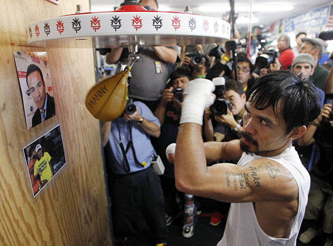 The week in sport: Manny Pacquiao works the speed bag at the Wild Card Boxing Club