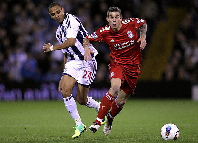 Premier League roundup: West Brom's Peter Odemwingie competes with Liverpool's Daniel Agger