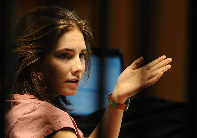 Amanda Knox trial: 23 September 2011: Amanda Knox gestures in court