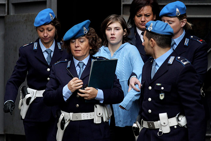 Amanda Knox timeline: 24 November 2010: Amanda Knox is led away from Perugia's Court of Appeal