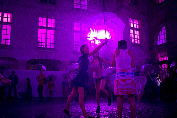 24 hours in pictures: Paris, France: People take part in an art installation by Pierre Ardouvin