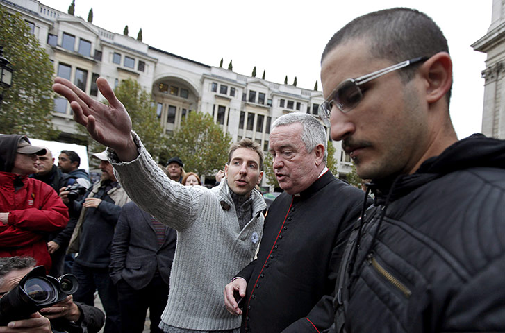Occupy London protests: Graham Knowles arrives to join open debate outside St Paul's Cathedral 