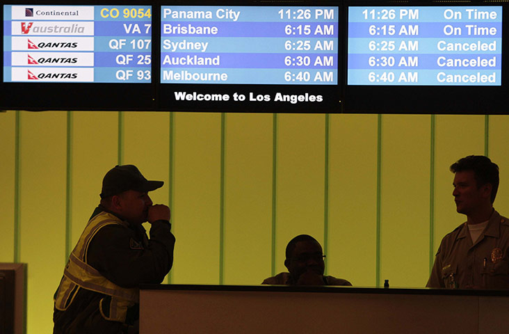 Qantas dispute: Electronic screens display cancelled Qantas Airline flights